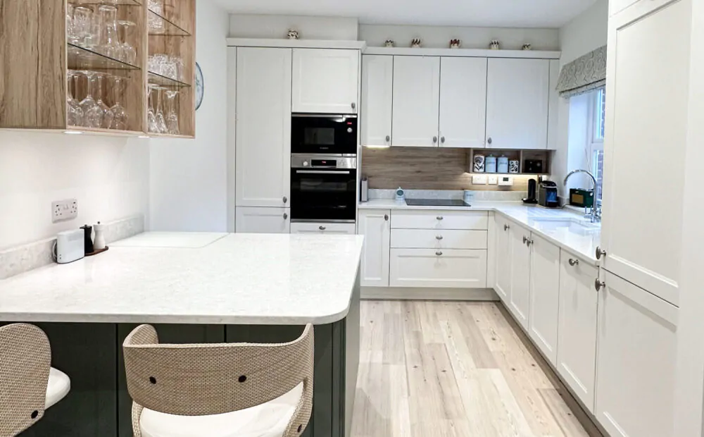 Elegant shaker-style kitchen overview with quartz countertops and neutral cabinetry