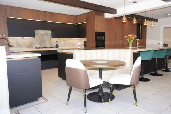 Luxury Handleless Kitchen with White Marble Island, Copper Tap & Breakfast Seating