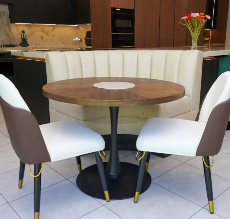 Modern kitchen featuring a white marble island with breakfast seating, designed and installed by MAS Kuchen.